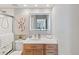 Bathroom with vanity, LED mirror and glass-enclosed shower at 1313 N Williams St # 1103, Denver, CO 80218