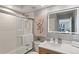 Modern bathroom with a glass-enclosed shower and vanity at 1313 N Williams St # 1103, Denver, CO 80218