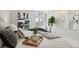Comfortable bedroom featuring a large bed with stylish decor at 1313 N Williams St # 1103, Denver, CO 80218