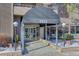 Welcoming building entrance with covered awning and clear glass doors at 1313 N Williams St # 1103, Denver, CO 80218