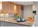 Bright kitchen featuring stainless steel appliances and granite countertops at 1313 N Williams St # 1103, Denver, CO 80218