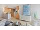 Open-concept living room flows into a modern kitchen area, with modern art at 1313 N Williams St # 1103, Denver, CO 80218