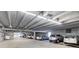 Brightly lit parking garage with ample parking spots for residents and guests at 1313 N Williams St # 1103, Denver, CO 80218