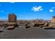Roof deck featuring lounge chairs with city and mountain views at 1313 N Williams St # 1103, Denver, CO 80218