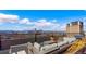 Rooftop deck features comfortable lounge seating and city views at 1313 N Williams St # 1103, Denver, CO 80218