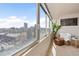Bright sunroom with large windows and city views at 1313 N Williams St # 1103, Denver, CO 80218