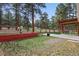 Scenic backyard featuring a fenced in yard, garden, and a charming patio, perfect for entertaining guests at 17720 Canterbury Dr, Monument, CO 80132