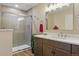 The bathroom features a sleek glass-enclosed shower, modern vanity, and fixtures for a spa-like experience at 17720 Canterbury Dr, Monument, CO 80132