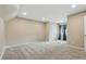 Bright bedroom with neutral carpet, paint, window with dark drapes and abundant natural light at 17720 Canterbury Dr, Monument, CO 80132