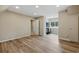 A bright and airy bedroom with hardwood floors and a closet provides a cozy and functional space at 17720 Canterbury Dr, Monument, CO 80132