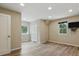 A bedroom with hardwood floors, natural light, and a closet offers comfort and style for a serene retreat at 17720 Canterbury Dr, Monument, CO 80132