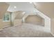 Large bonus room with carpet flooring, neutral walls, and natural light at 17720 Canterbury Dr, Monument, CO 80132