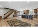Large open kitchen and staircase at 17720 Canterbury Dr, Monument, CO 80132