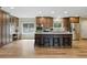 Well-lit kitchen with stainless steel appliances and a breakfast bar at 17720 Canterbury Dr, Monument, CO 80132