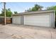 Spacious two-car garage with concrete driveway at 3008 N York St, Denver, CO 80205