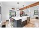 Charming kitchen with a farmhouse sink, butcher block counters, and pendant lighting at 3008 N York St, Denver, CO 80205