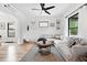 Inviting living room featuring a comfortable sectional sofa, and stylish decor at 3008 N York St, Denver, CO 80205