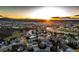 Neighborhood shot at sunset with a backdrop of mountains at 4157 Astrion Ct, Castle Rock, CO 80104