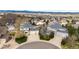An elevated view showcasing the home's location in a peaceful neighborhood with mountain views at 4157 Astrion Ct, Castle Rock, CO 80104