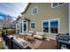 Spacious back deck offers ample seating and a grill for outdoor entertaining at 4157 Astrion Ct, Castle Rock, CO 80104