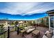 Inviting back deck with outdoor seating and views of the surrounding neighborhood at 4157 Astrion Ct, Castle Rock, CO 80104