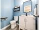 Stylish powder room with modern fixtures and appealing wall color at 4157 Astrion Ct, Castle Rock, CO 80104