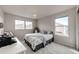 Bright bedroom with a chandelier, windows, carpeted floors, and modern decor at 4157 Astrion Ct, Castle Rock, CO 80104