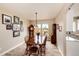 Traditional dining room adjacent to the kitchen with hard surface floors at 4157 Astrion Ct, Castle Rock, CO 80104