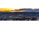 Picturesque landscape view of rolling hills and a dramatic sky during a vibrant sunset at 4157 Astrion Ct, Castle Rock, CO 80104
