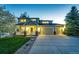 Inviting two-story home featuring a well-kept yard, covered porch, and a convenient three-car garage at 4157 Astrion Ct, Castle Rock, CO 80104