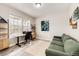 Inviting home office with natural light and a comfortable sitting area at 4157 Astrion Ct, Castle Rock, CO 80104