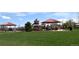 View of the community park with picnic spots, a playground, and green spaces at 4157 Astrion Ct, Castle Rock, CO 80104