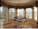 Eat-in breakfast nook with a wood table set, bright natural light, and pleasant outdoor views at 6368 S Walden Way, Aurora, CO 80016
