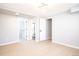 Finished basement includes adjacent updated bathroom with a black-framed shower door at 10932 W 107Th Ave, Broomfield, CO 80021