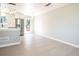 Spacious living area with modern flooring, neutral paint and an open layout connecting to the updated kitchen at 10932 W 107Th Ave, Broomfield, CO 80021