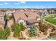 Aerial view of a home with a well-manicured yard, patio, and stunning neighborhood at 6999 S Tempe Ct, Aurora, CO 80016