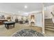 Spacious finished basement featuring a pool table, neutral walls and recessed lighting at 6999 S Tempe Ct, Aurora, CO 80016