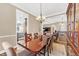 Spacious dining room showcases an open layout with views of the kitchen, living room, and staircase at 6999 S Tempe Ct, Aurora, CO 80016