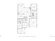 Detailed floor plan layout of the first floor featuring bedrooms, kitchen, living room, and garage at 6999 S Tempe Ct, Aurora, CO 80016