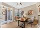 Inviting home office with natural light, neutral colors, and classic wooden desk at 6999 S Tempe Ct, Aurora, CO 80016