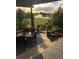 Inviting patio with an outdoor dining area and lush green views, perfect for relaxing and entertaining at 6999 S Tempe Ct, Aurora, CO 80016