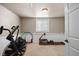 Finished basement featuring exercise equipment and plenty of space for activities at 7099 Cerney Cir, Castle Pines, CO 80108