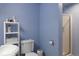 Bathroom with a walk-in shower and storage shelves at 7099 Cerney Cir, Castle Pines, CO 80108