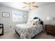Serene bedroom with plush bedding, decorative pillows, and calming decor at 7099 Cerney Cir, Castle Pines, CO 80108