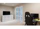 Bedroom with a desk, storage, and natural light at 7099 Cerney Cir, Castle Pines, CO 80108