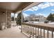 Inviting front porch with stylish railings and a view of the neighborhood at 7099 Cerney Cir, Castle Pines, CO 80108