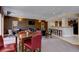 Spacious clubhouse features a bar area, tables, chairs, and a television for entertaining at 9039 E Panorama Cir # C201, Englewood, CO 80112