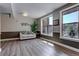 Sitting area with wood floors, large windows with views, and modern decor at 9039 E Panorama Cir # C201, Englewood, CO 80112