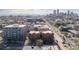 Aerial view of Denver apartment building with city skyline in the background at 1475 N Humboldt St # 22, Denver, CO 80218
