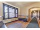 Hallway view highlighting the dark-trim, carpet runner, and arched doorway, showcasing classic features at 1475 N Humboldt St # 22, Denver, CO 80218